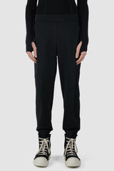 UY Studio - front view of black casual jogging pants for men from the FW24 collection feature a flexible elastic waistband and leg cuffs, offering both comfort and style.