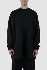 UY Studio - front view of big black cozy oversized cotton sweater for men from the FW24 collection offers a relaxed, baggy fit with a round neckline and stylish pleated sleeves.