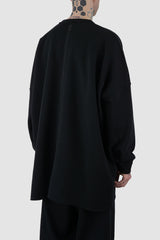 UY Studio - back side view of big black cozy oversized cotton sweater for men from the FW24 collection offers a relaxed, baggy fit with a round neckline and stylish pleated sleeves.