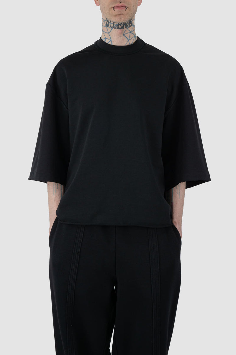 UY Studio - front relaxed view of Black Cropped Heavy Cotton T-Shirt for men from the FW24 collection features an oversized fit with extended shoulders and a close-fitting collar.