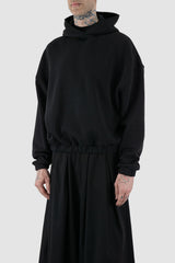 UY Studio - front side view of black convertible oversized hooded sweater.