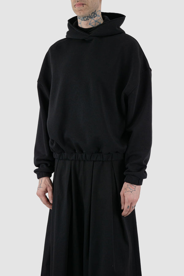 UY Studio - front side view of black convertible oversized hooded sweater.