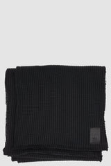 UY Studio - Front view of black knitted long Snaky scarf with crossgrain design, double layer raw edge, Permanent Collection.