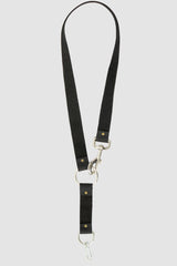 UY Studio - back view of black leather keychain from the Permanent Collection is crafted from calf leather and features a durable metal hook and D-ring.