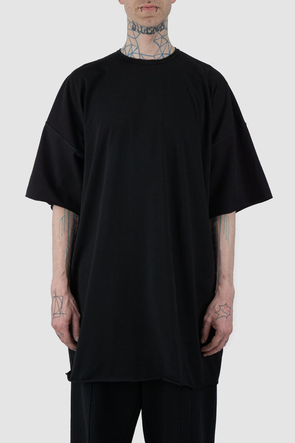 UY Studio - front view of Black Long Oversized Heavy Cotton T-Shirt for men from the FW24 collection offers a straight, clean cut with overlapping shoulders and inverted seams.