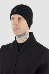 UY Studio - Model view of black bamboo beanie.