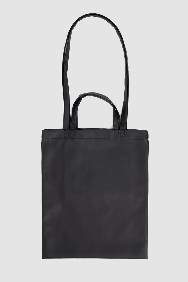 UY Studio - solo front view of black vegan leather shopper tote bag from the FW24 collection with two different straps, an inside pocket for purses and cotton lining.