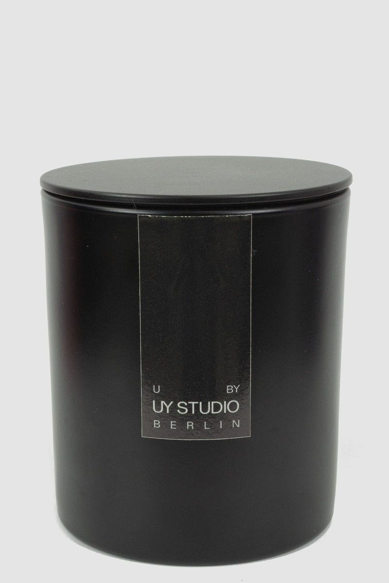 UY Studio - detail view of Signature Big Candle U in 400ml reusable black glass jar, vegan, cruelty-free, Permanent Collection.