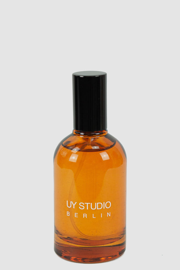UY Studio - Front view of Signature Parfum U in 50ml amber glass flacon with plastic trigger spray, Permanent Collection.
