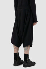 Back view of Black Cropped Cotton Pants for Men with applied patch details, LA HAINE INSIDE US