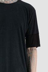 XConcept - front arm detail view of black asymmetrical bamboo t-shirt for men from the FW24 collection has a double-layered, tapered front and sleeves.