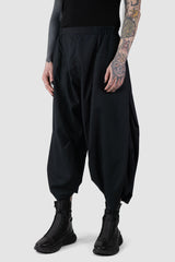 XConcept - front side view of Black Cropped Loose Fit Linen Trousers