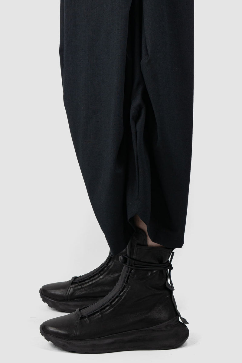 XConcept - cuff view of Black Cropped Loose Fit Linen Trousers