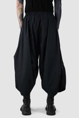 XConcept - back view of Black Cropped Loose Fit Linen Trousers