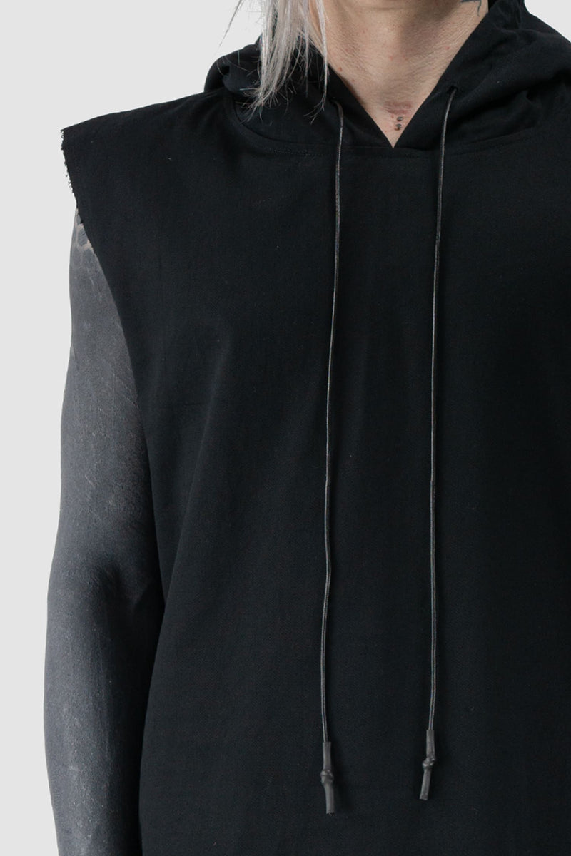 XConcept - front detail view of Black Long Hooded Sleeveless Top