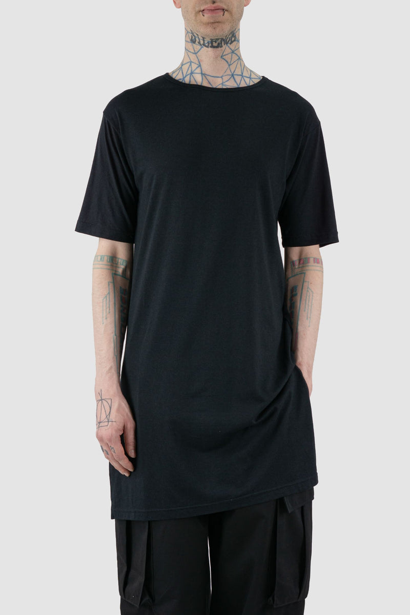 XConcept - Front legere view of black overlength bamboo T-shirt for men with side slits, round neckline, FW24 Collection.