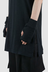 XConcept - slit view of black overlength bamboo T-shirt for men with side slits, round neckline, FW24 Collection.