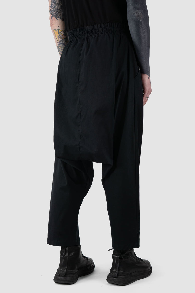 XConcept - back side view of Black Relaxed Fit Cropped Cotton Trousers