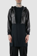 XConcept - Front open view of black hooded jacket made of vegan leather for men with slightly shortened sleeves, cropped 'bolero' length, FW24 Collection.