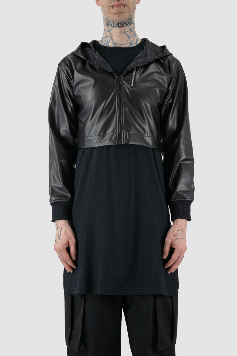 XConcept - Front view of black hooded jacket made of vegan leather for men with slightly shortened sleeves, cropped 'bolero' length, FW24 Collection.