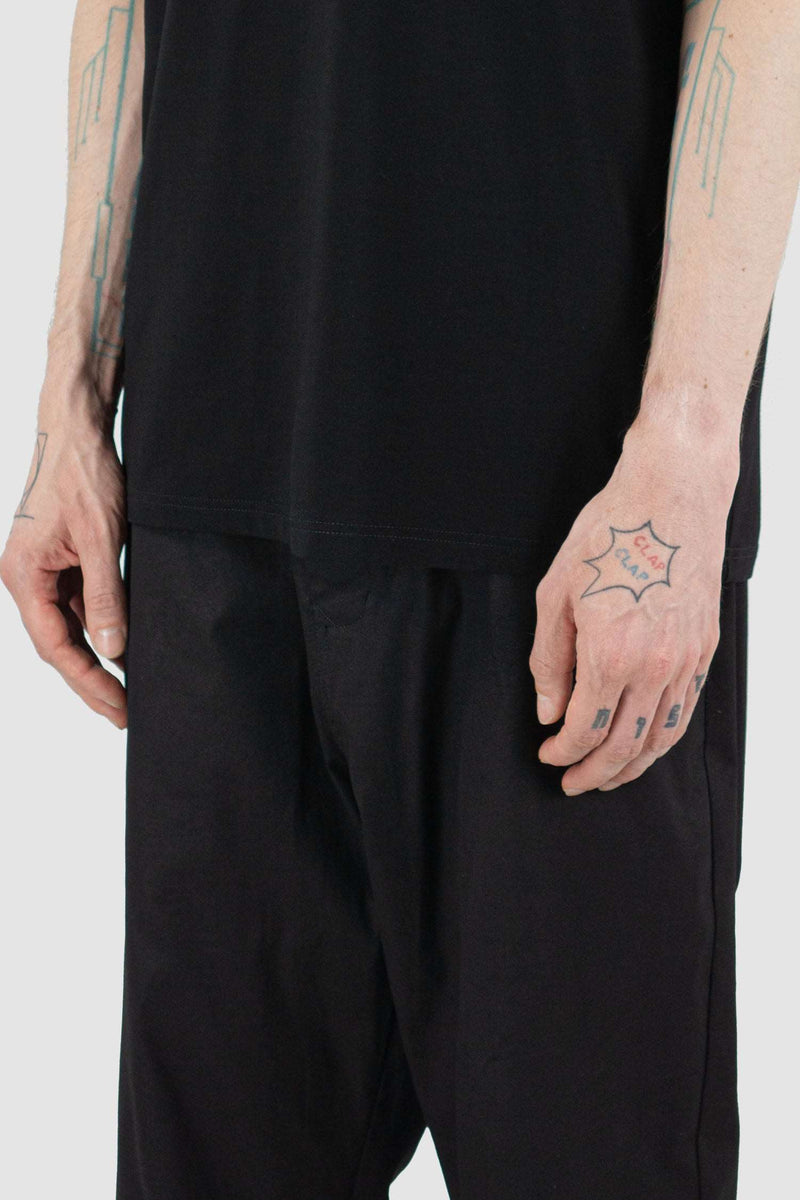 Close up view of Black Standard T-Shirt for Men with loose fit and round neckline, FW23, NOMEN NESCIO