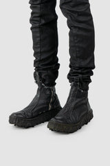 Culture of Brave - Black Chelsea Leather Sneaker - Melt Seal - Model front left view