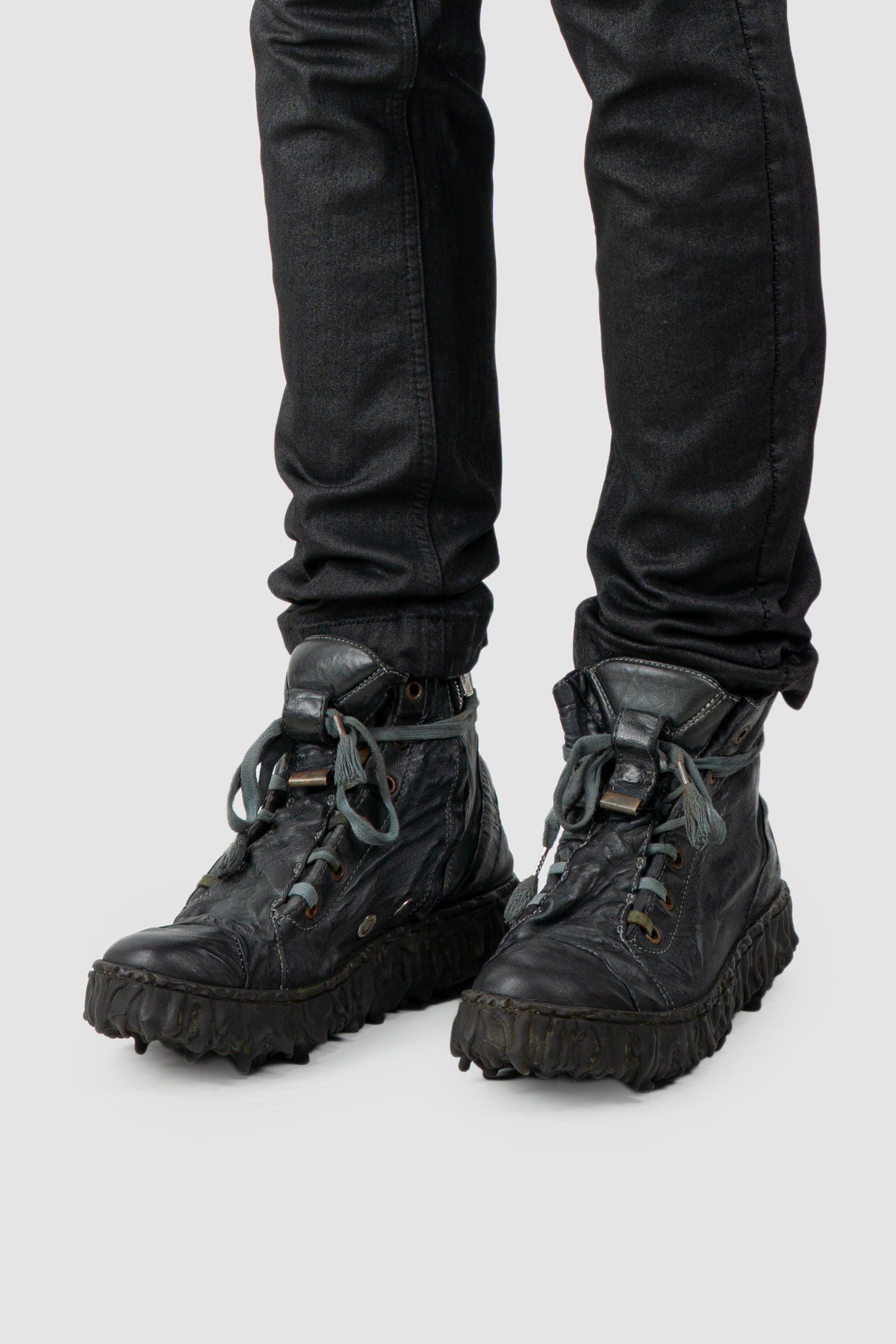 Culture of Brave - Men's Black Slate Leather Sneaker - Melt Dan - Model front left view