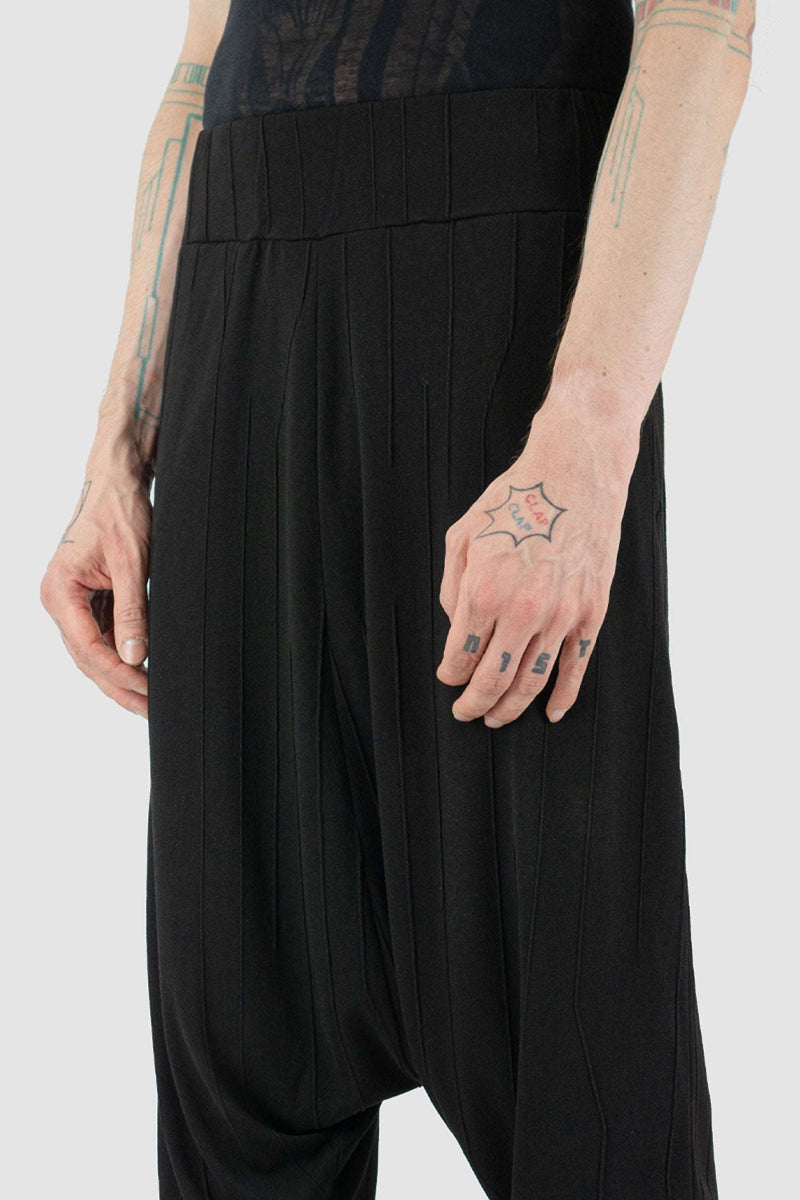 Side view of Black Harem Mix Blend Sweatpants for Men with deep crotch detail, LA HAINE INSIDE US