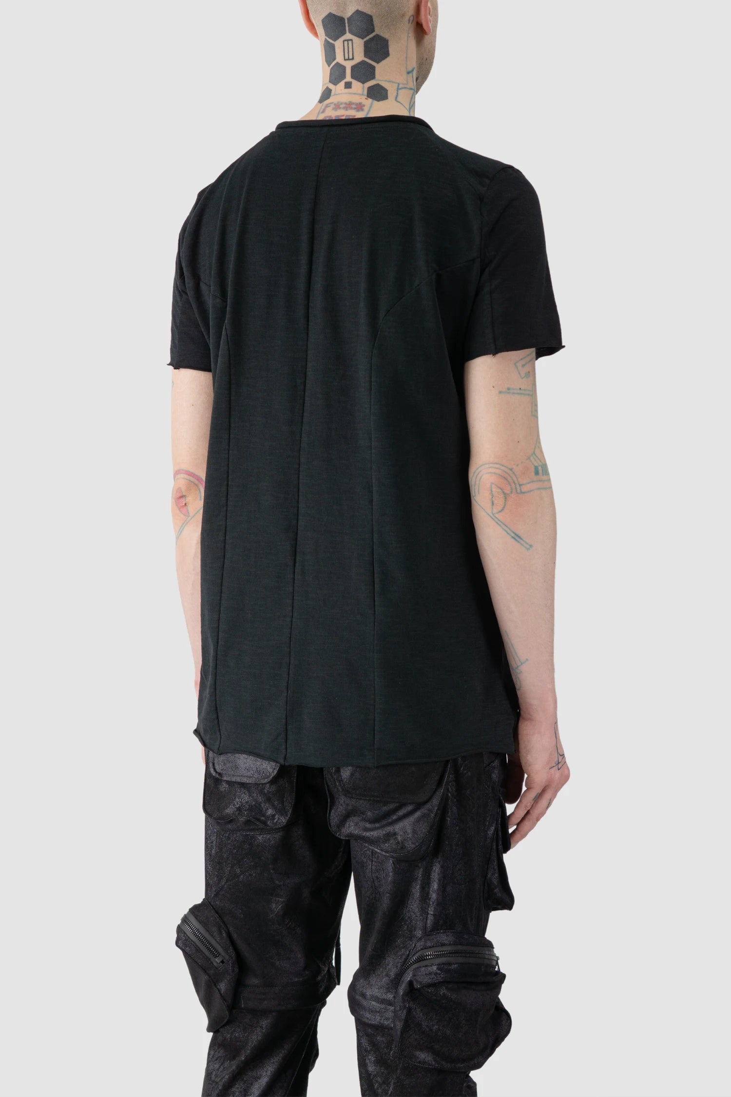 Gall Laboratories by Justin Gall - model back side view of men’s Black Brushed Cotton Geometric Seam Short Sleeve T-Shirt