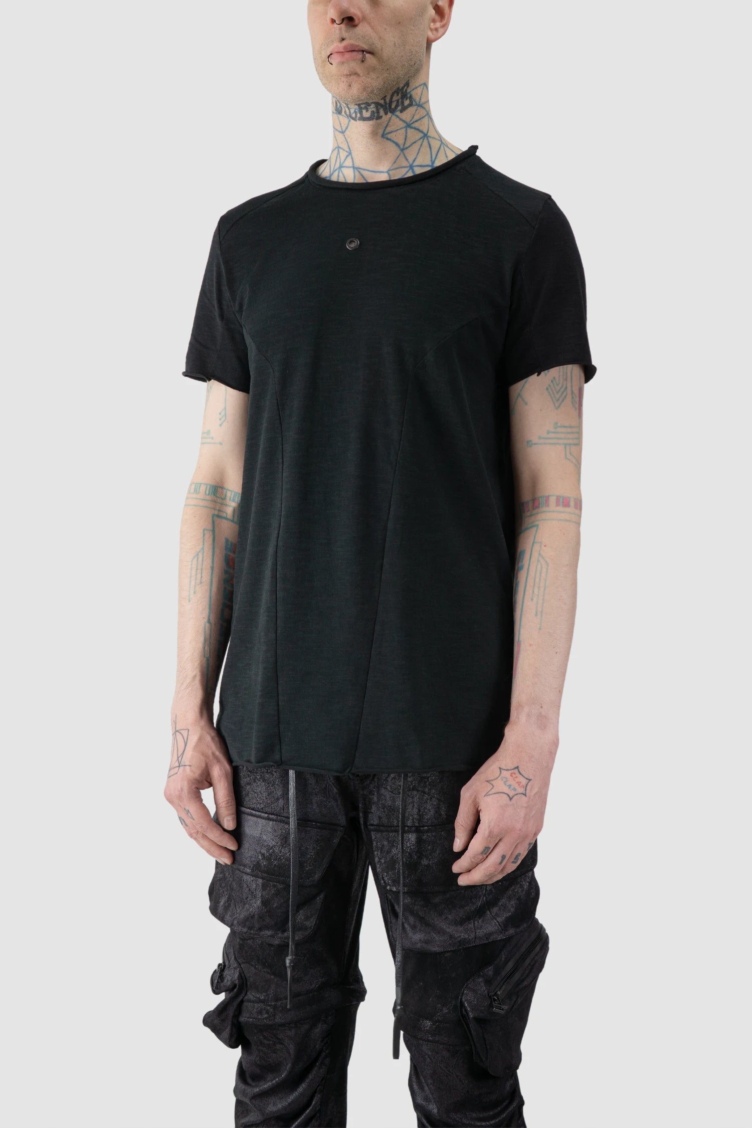 Gall Laboratories by Justin Gall - model front side view of men’s Black Brushed Cotton Geometric Seam Short Sleeve T-Shirt