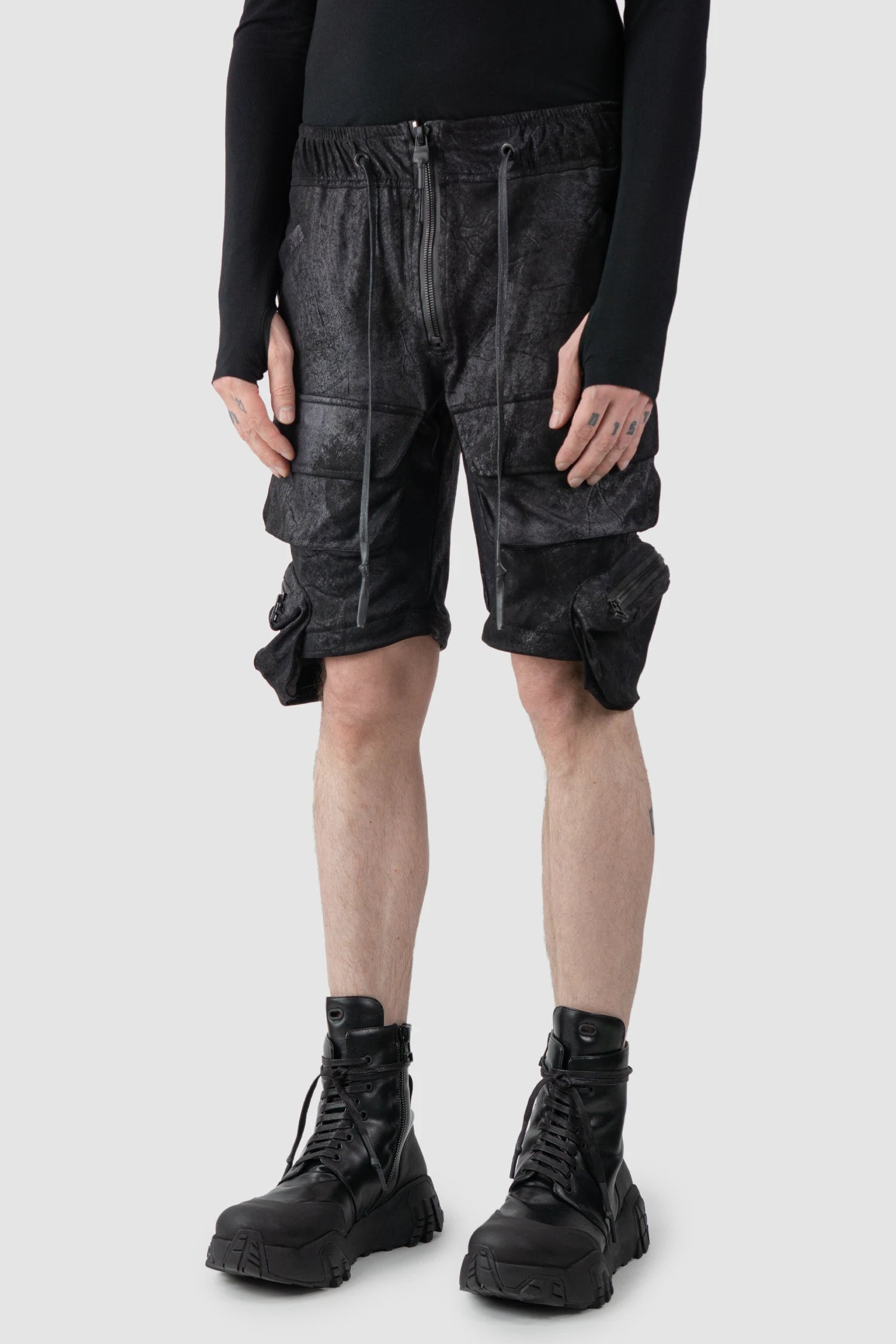 Gall Laboratories by Justin Gall - model front side short view of men’s Black Vegan Leather Convertible Cargo Trousers