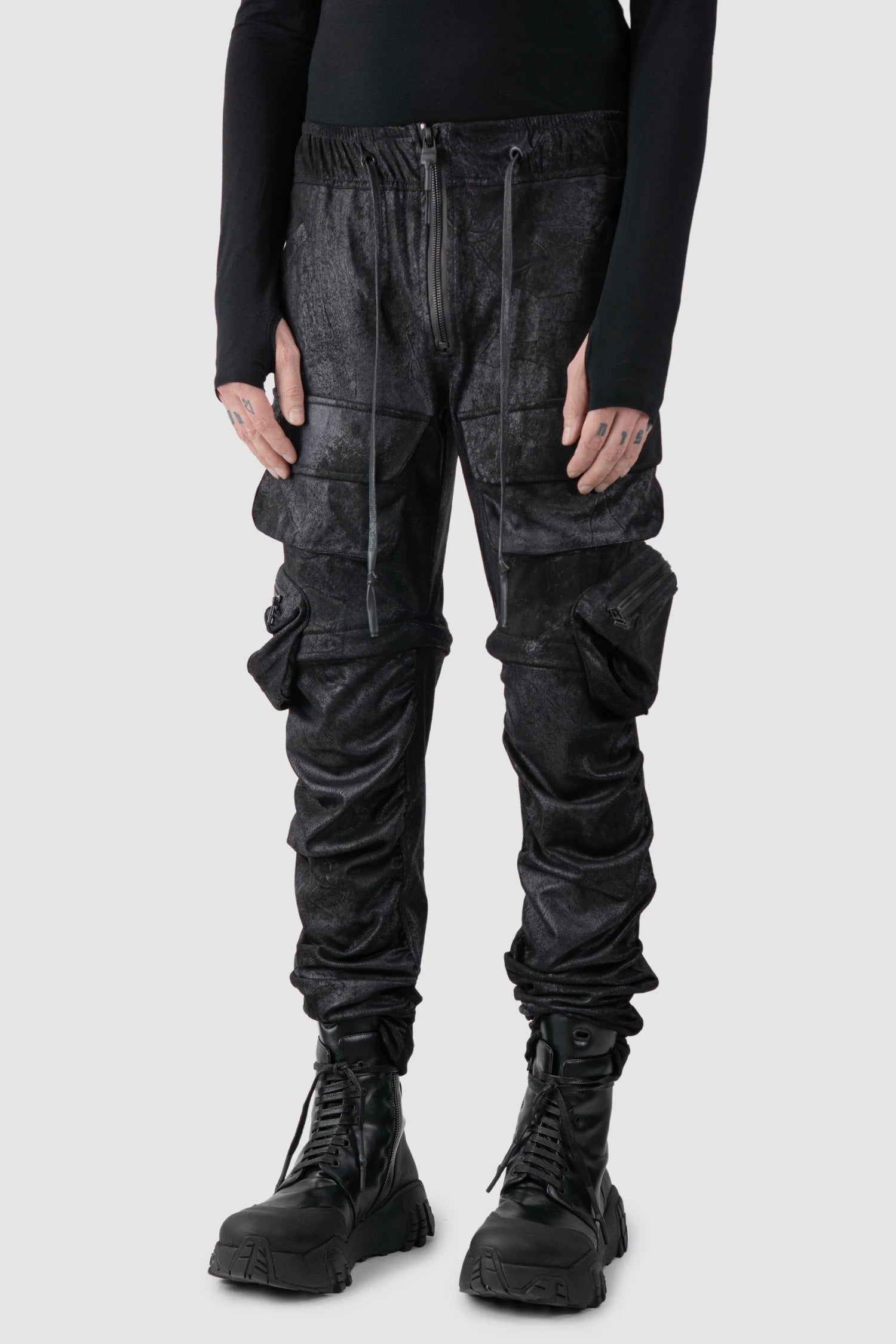 Gall Laboratories by Justin Gall - model front side view of men’s Black Vegan Leather Convertible Cargo Trousers