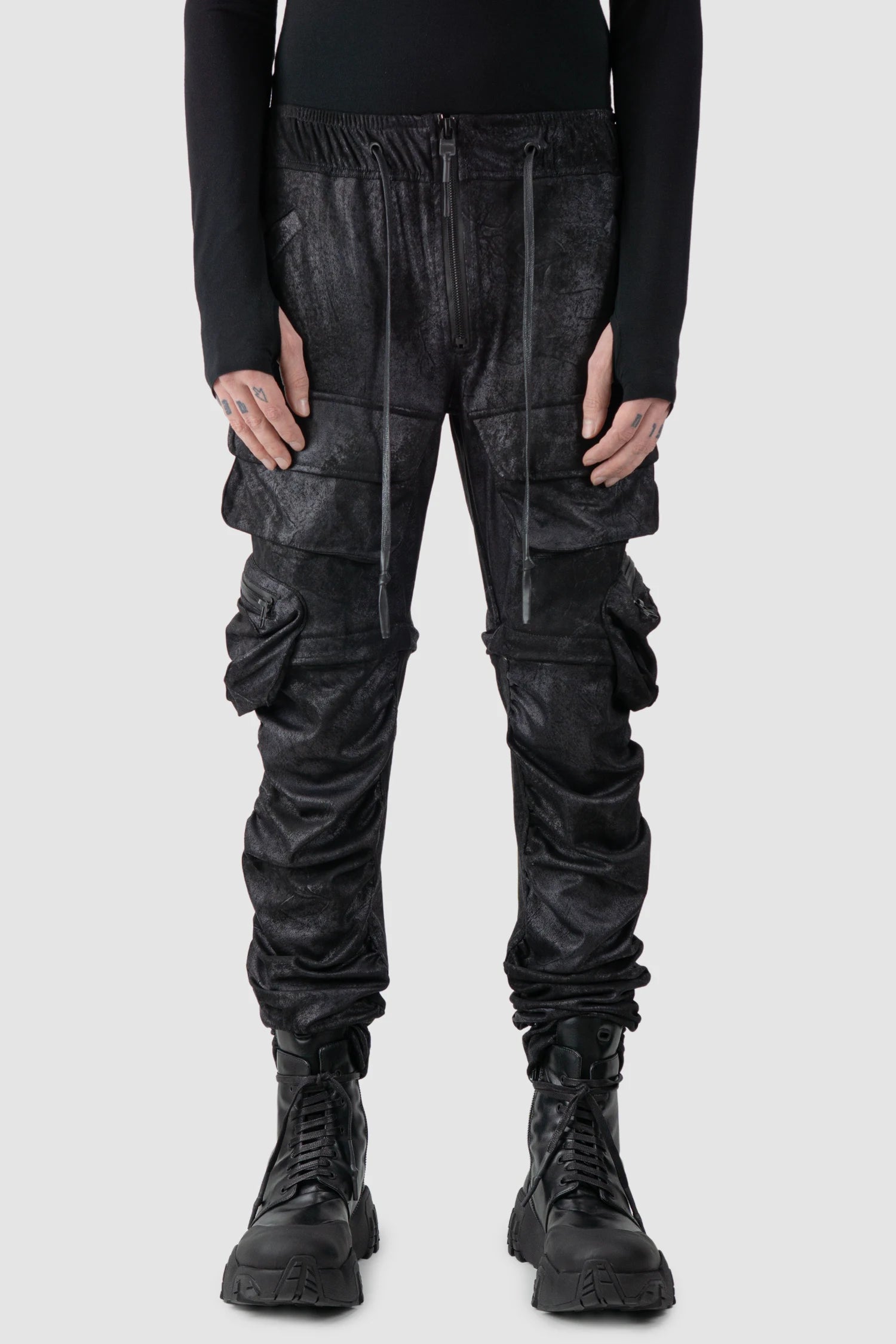 Gall Laboratories by Justin Gall - model front view of men’s Black Vegan Leather Convertible Cargo Trousers