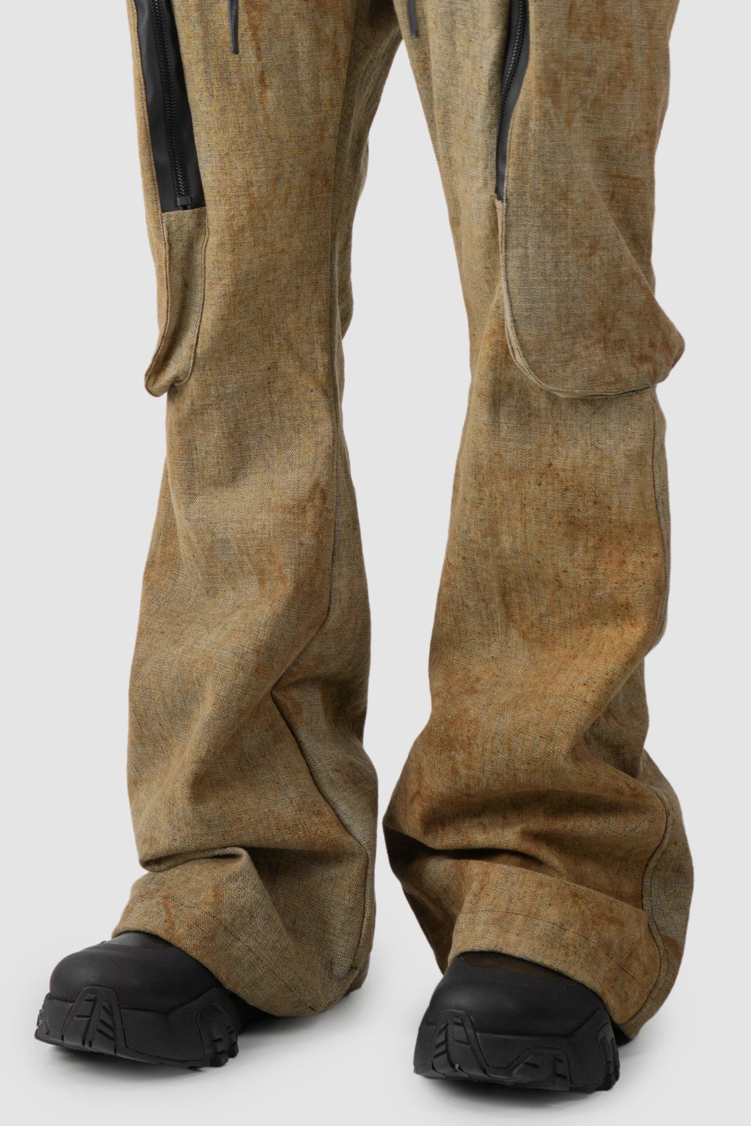 Gall Laboratories by Justin Gall - hem detail view of men’s Brown Rusted Denim Flared Cargo Trousers