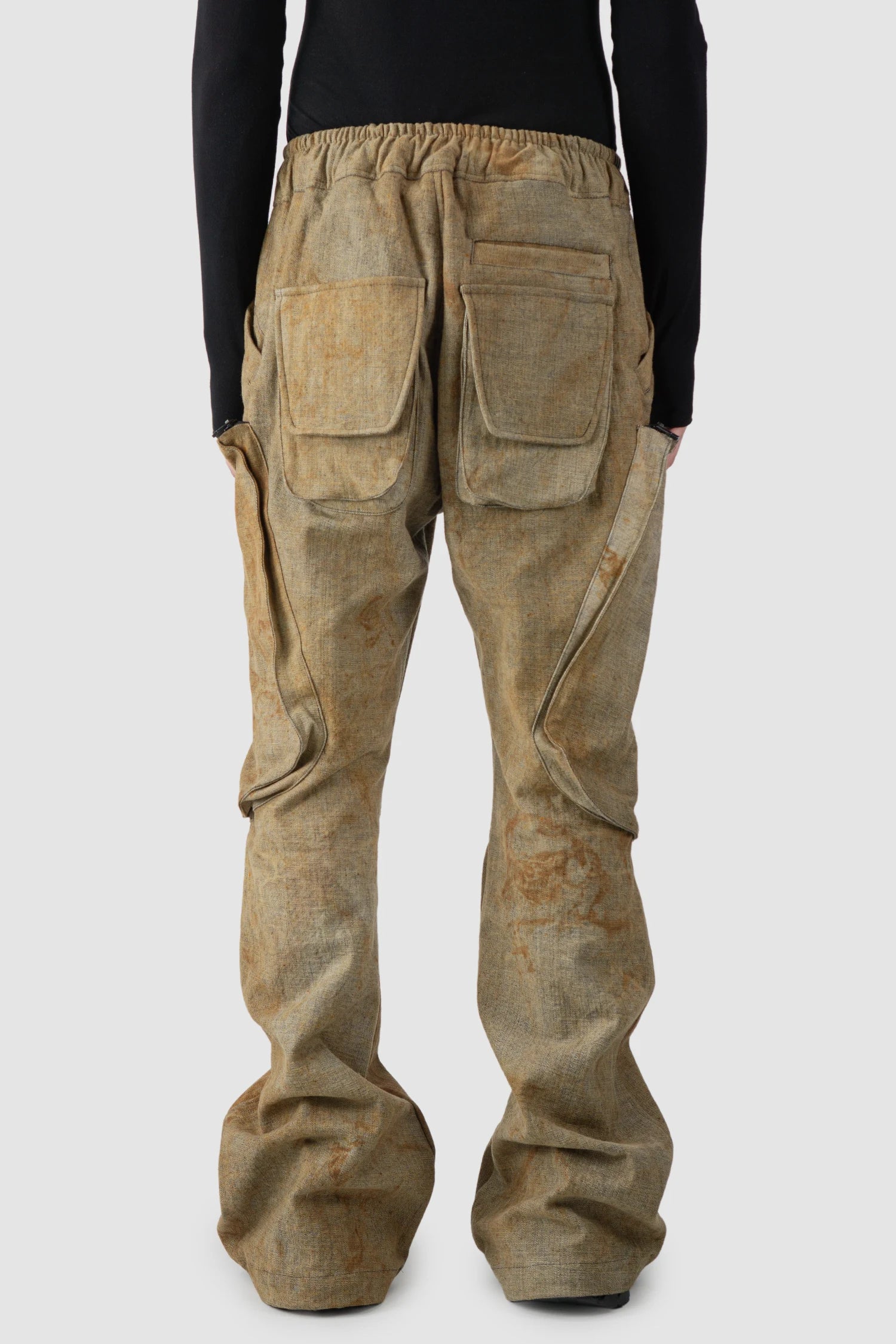 Gall Laboratories by Justin Gall - model back view of men’s Brown Rusted Denim Flared Cargo Trousers