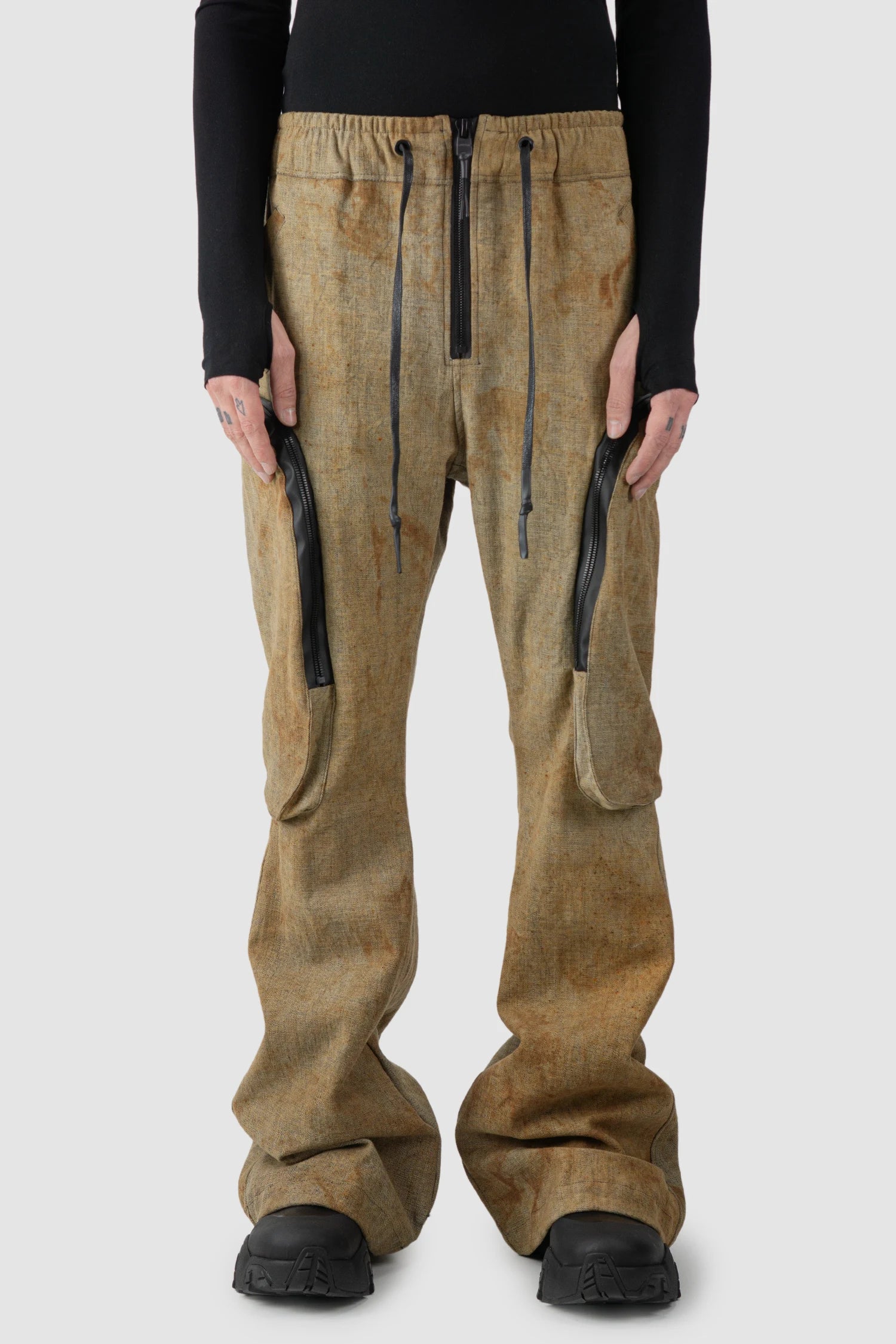 Gall Laboratories by Justin Gall - model front view of men’s Brown Rusted Denim Flared Cargo Trousers
