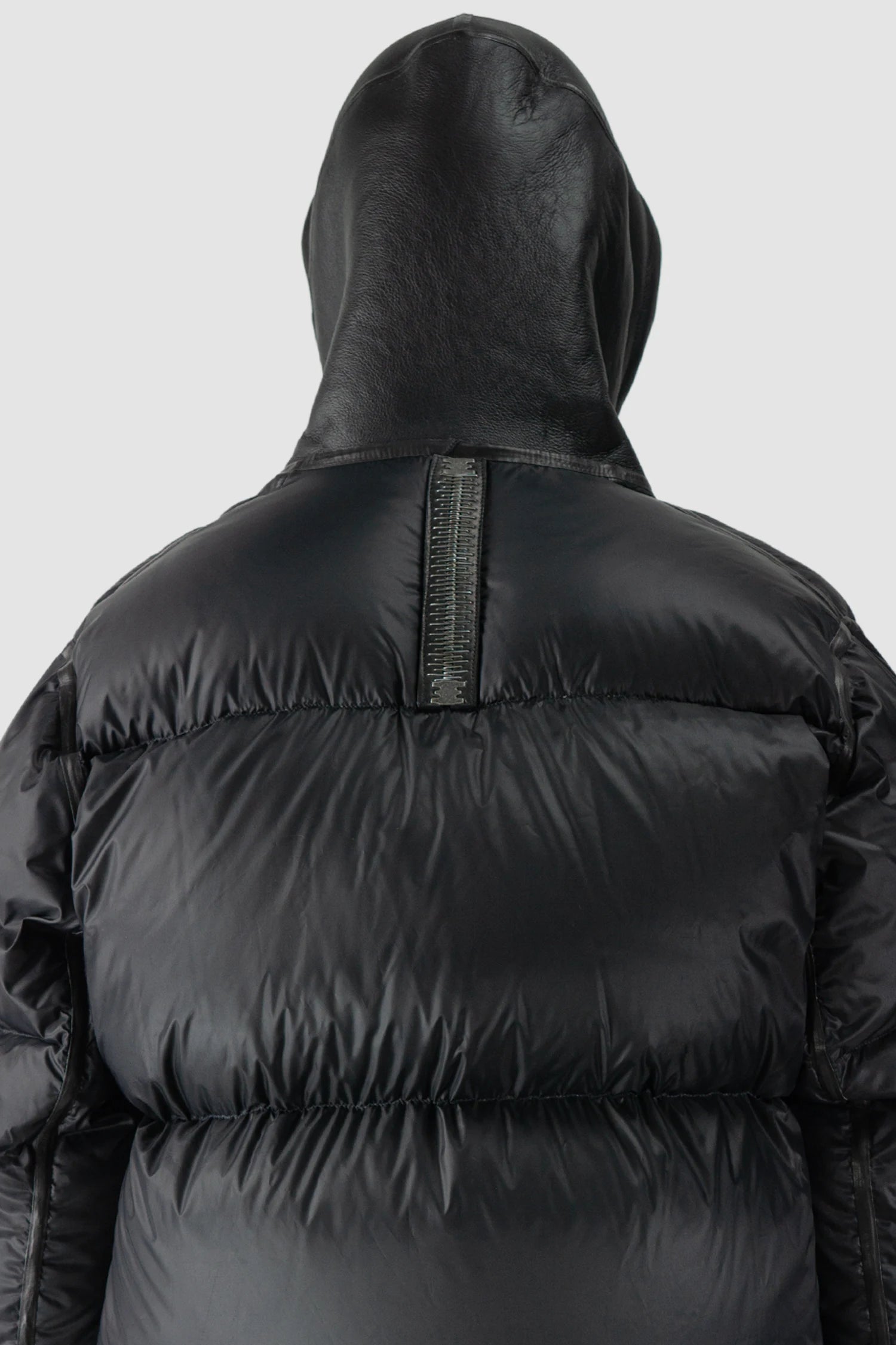 Isaac Sellam - back detail view of men’s Black Hooded Cropped Shearling and Down Puffer Jacket