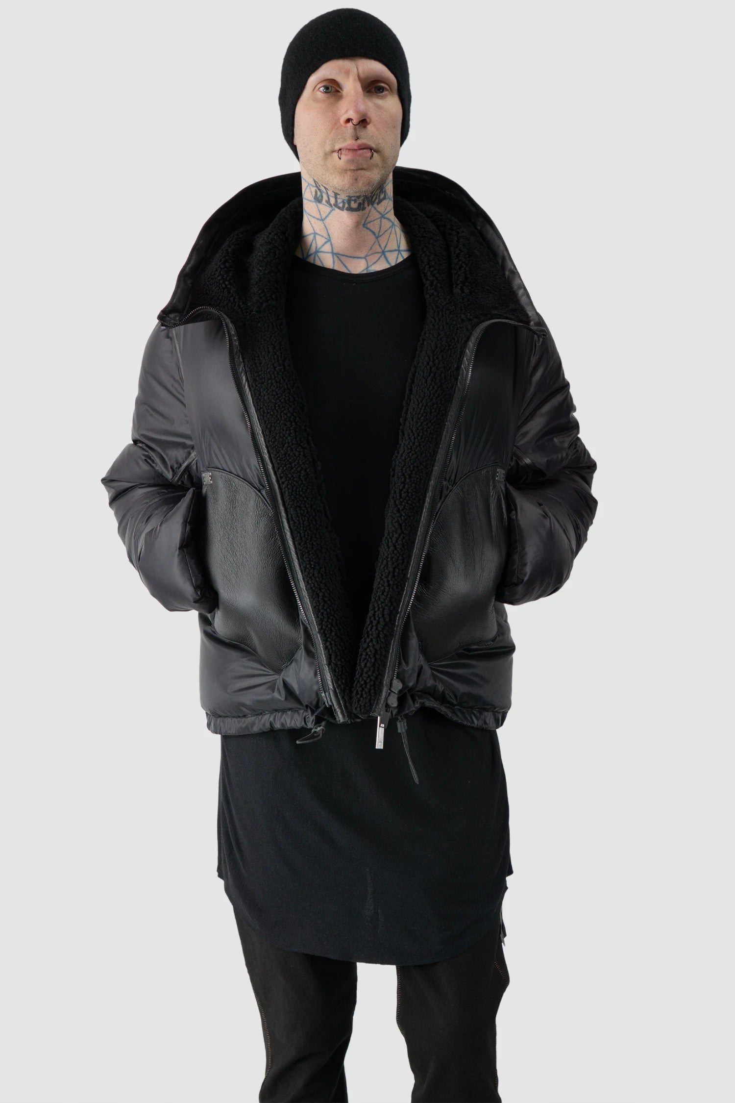 Isaac Sellam - model front relaxed view of men’s Black Hooded Cropped Shearling and Down Puffer Jacket