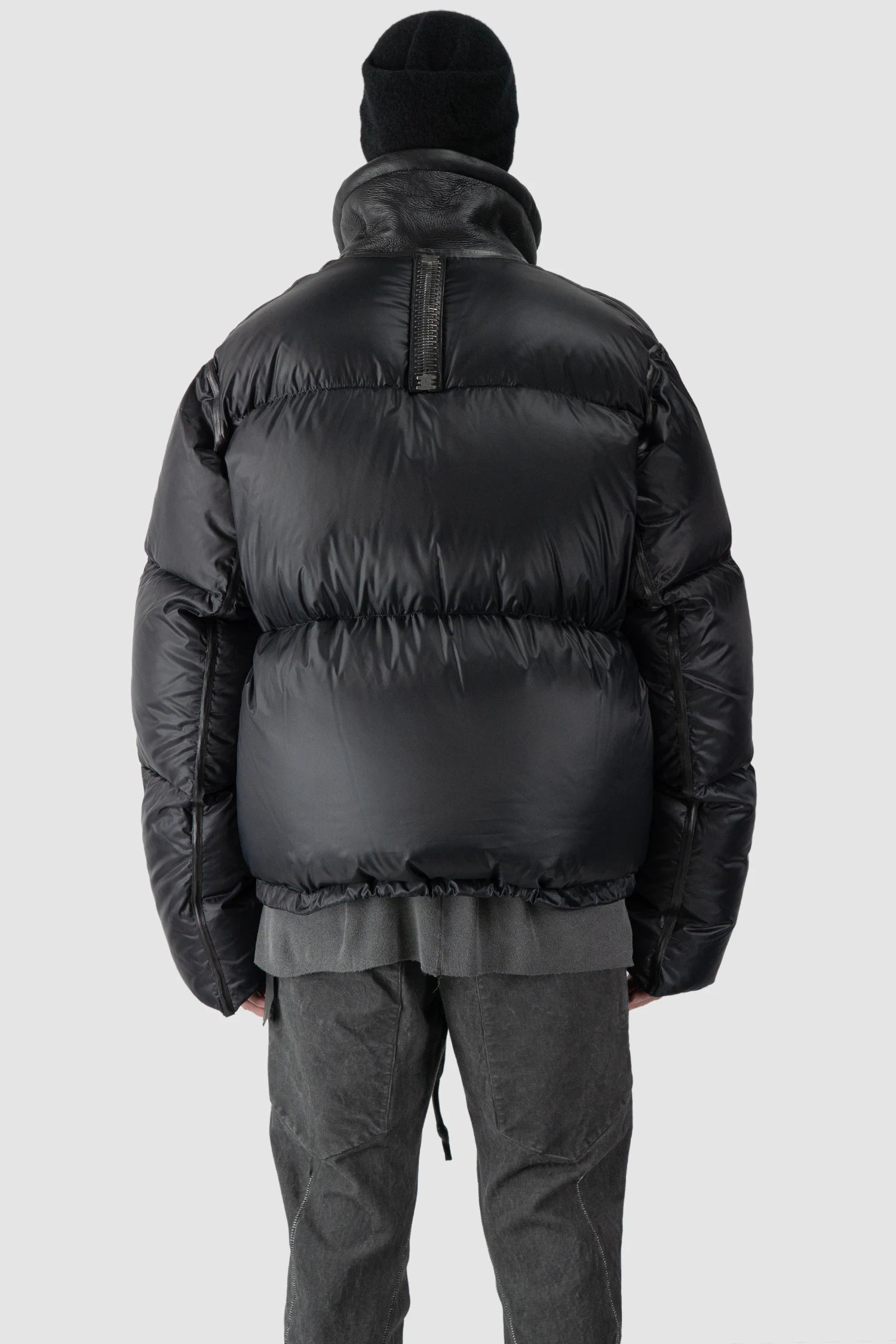Isaac Sellam - model back open view of men’s Black Shearling Leather and Down Cropped Puffer Jacket