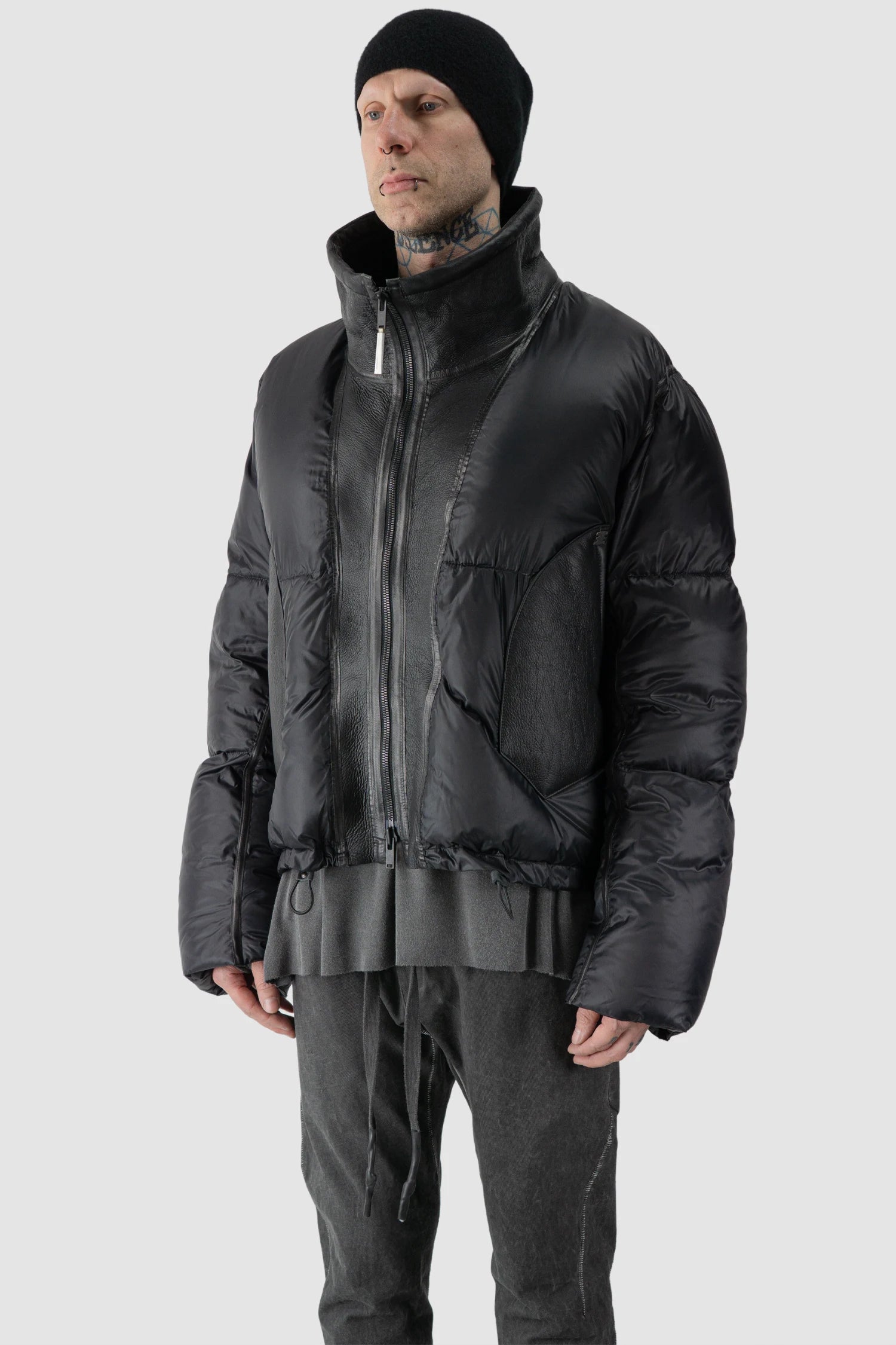 Isaac Sellam - model front side view of men’s Black Shearling Leather and Down Cropped Puffer Jacket