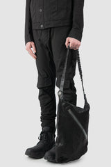 Isaac Sellam Experience - Nomade Men’s Black Asymmetric Lamb Leather Crossbody Bag model hand hold view
