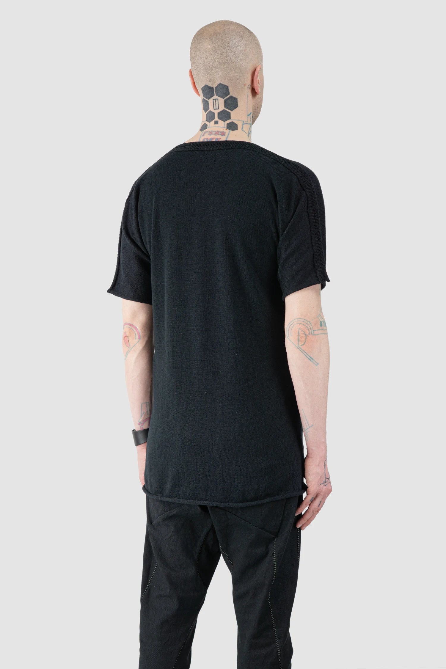 Isaac Sellam - Men’s Black Reversible Knitted Spine T-Shirt model back side view