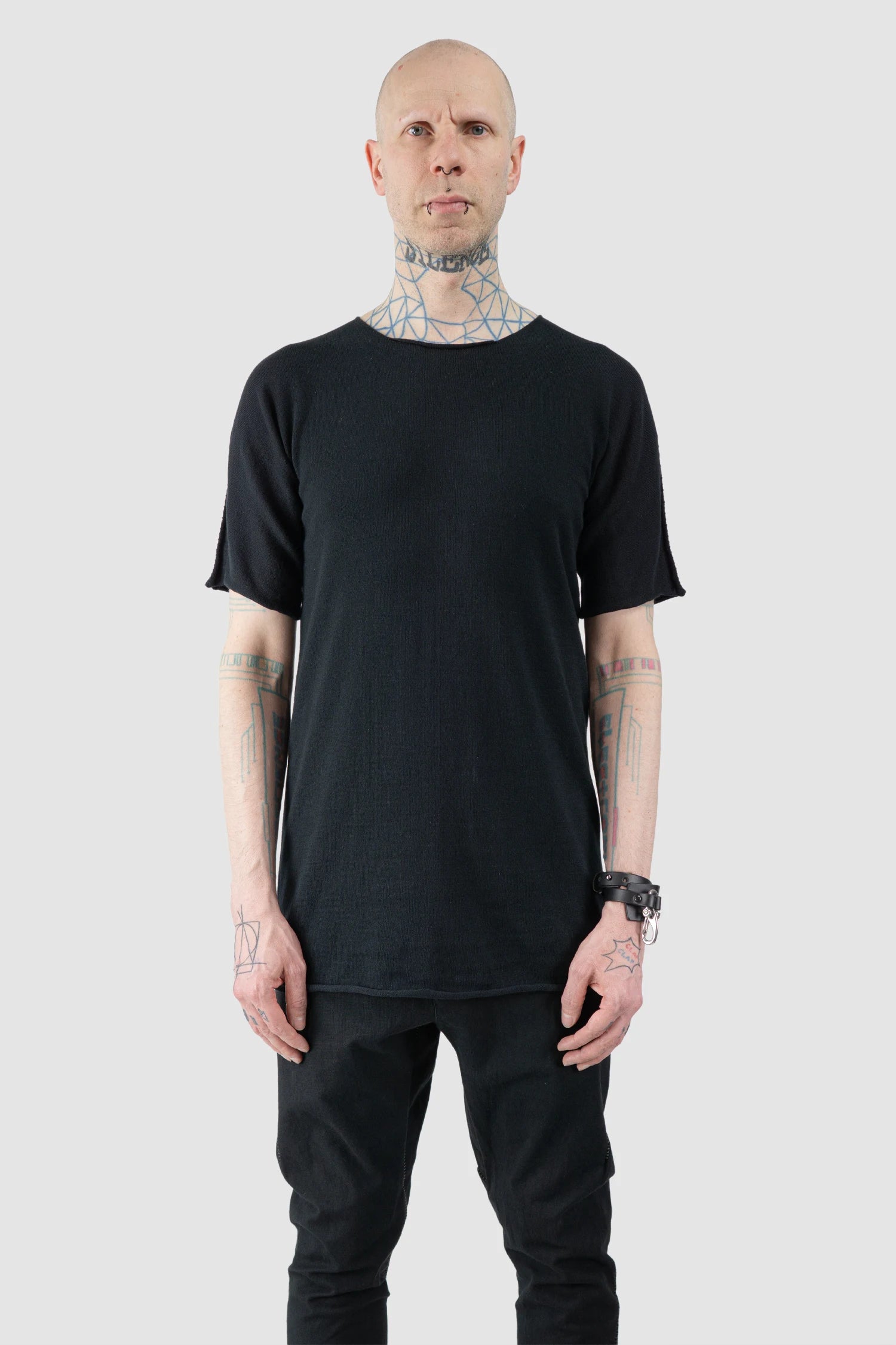 Isaac Sellam - Men’s Black Reversible Knitted Spine T-Shirt model front view