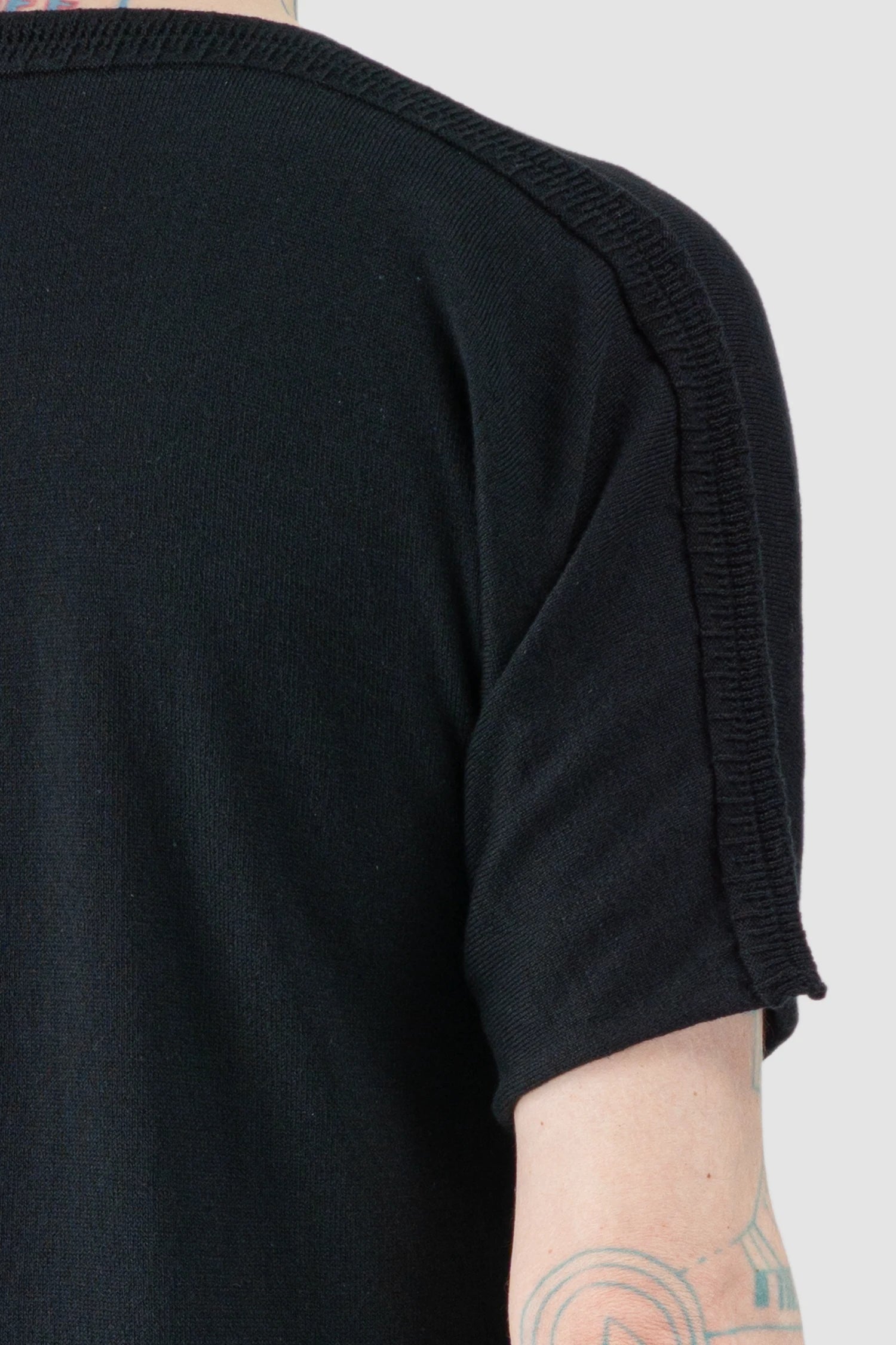 Isaac Sellam - Men’s Black Reversible Knitted Spine T-Shirt spine detail view