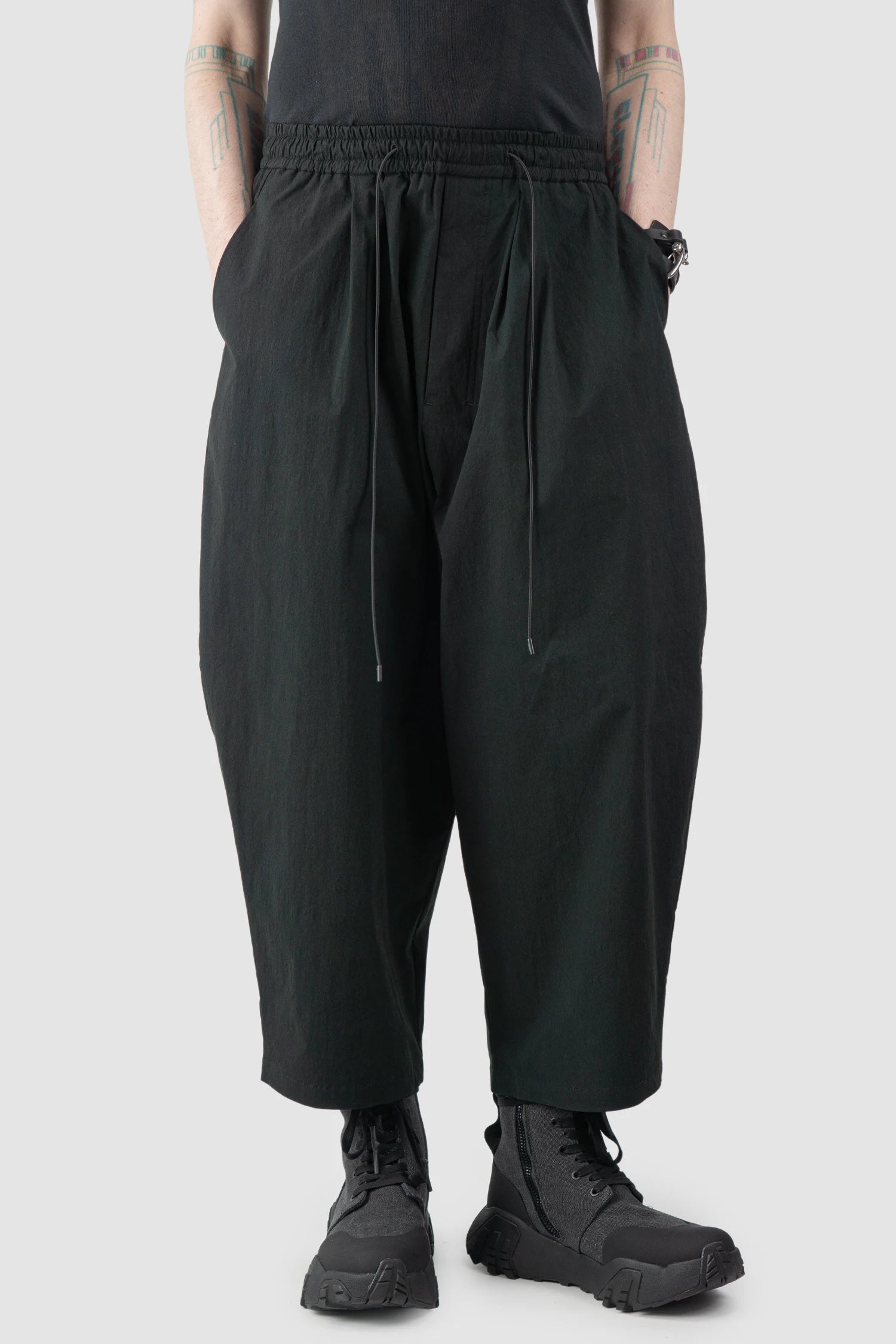 Joe Chia - Men’s Black Cropped Drop Crotch Cotton Blend Trousers model relaxed view