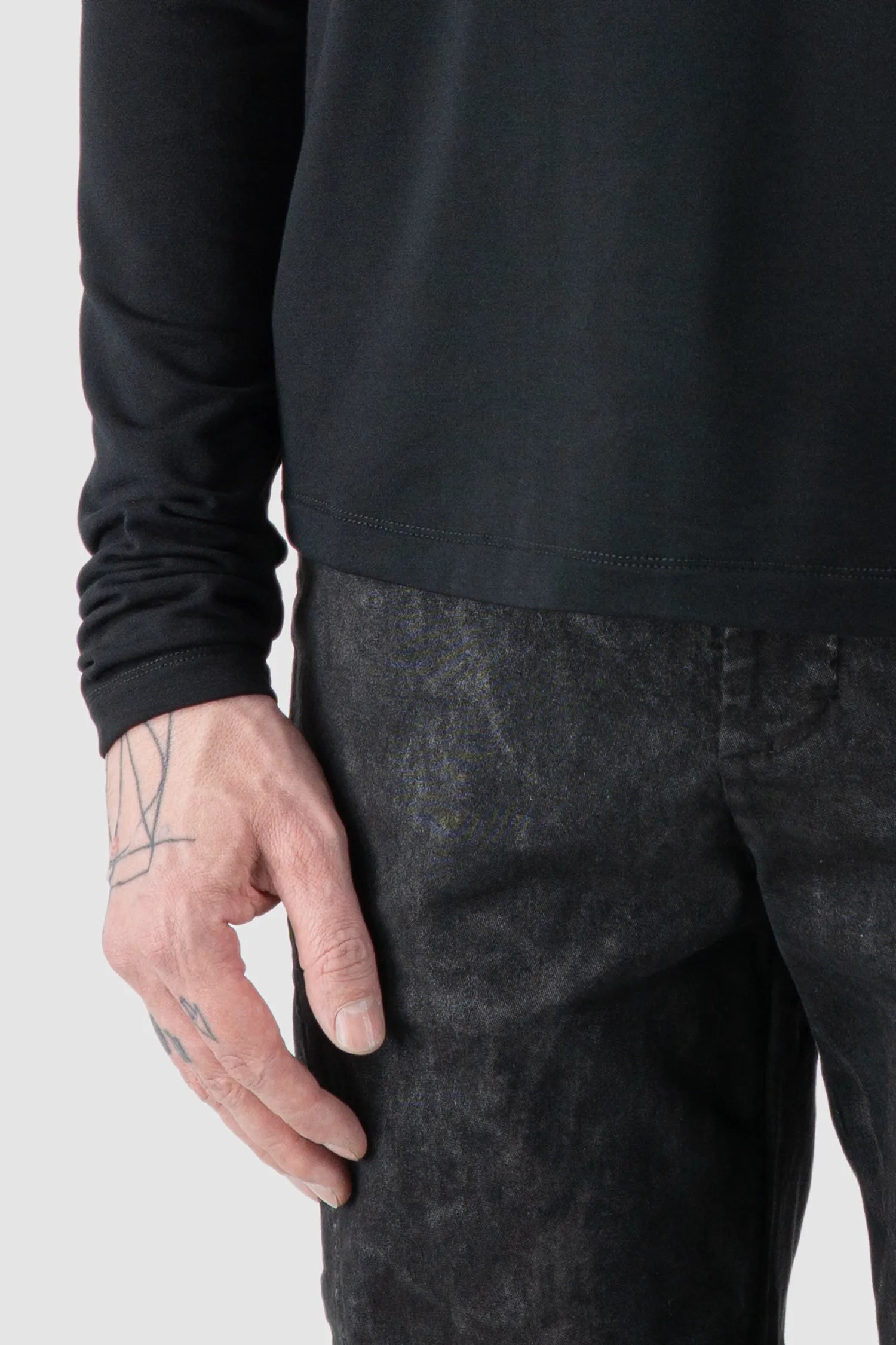 La Haine Inside Us - Men's Black Bamboo Turtleneck Sweater - Hem detail view
