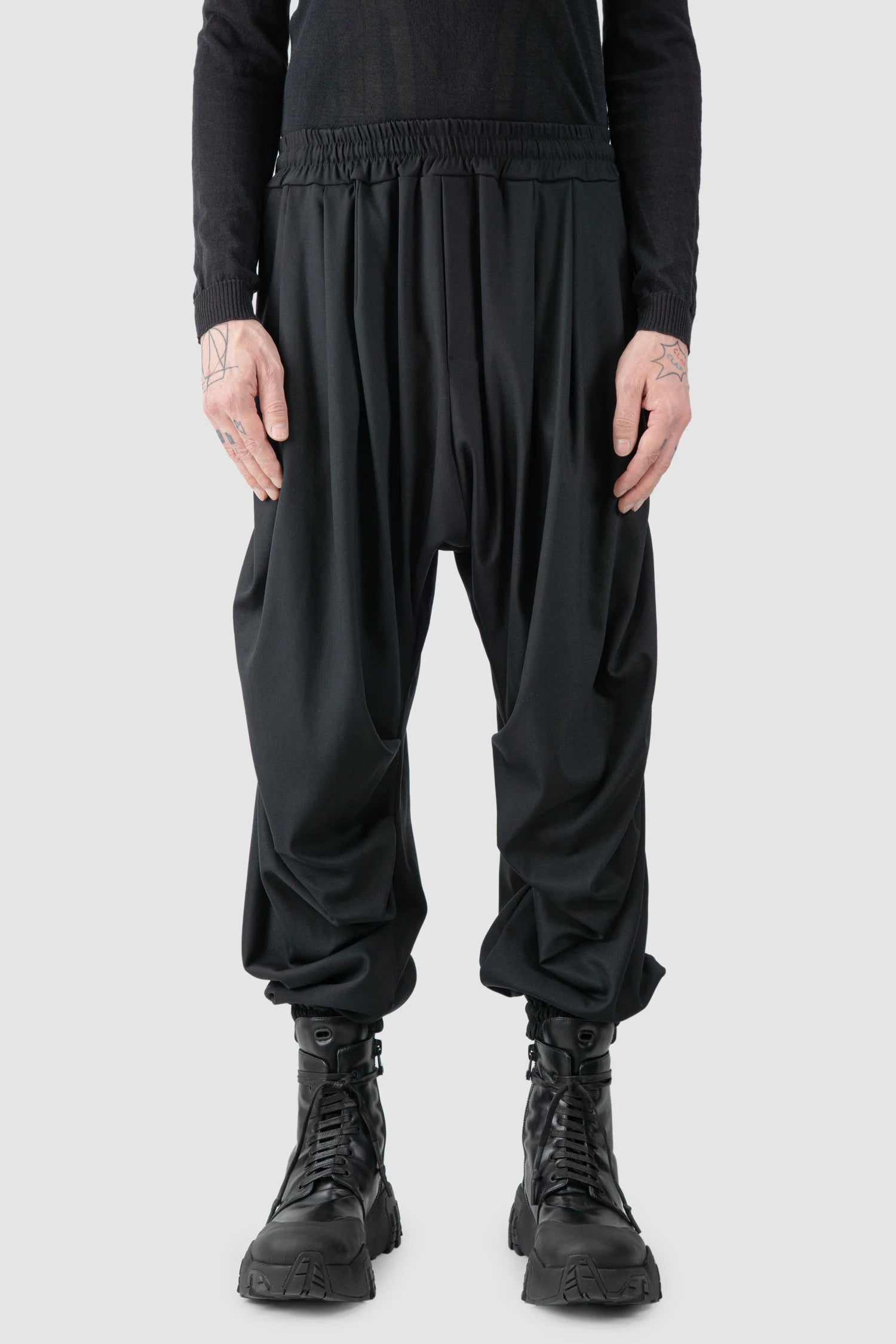 La Haine Inside Us - model front view of men’s Black Fluid Leg Draping Trousers