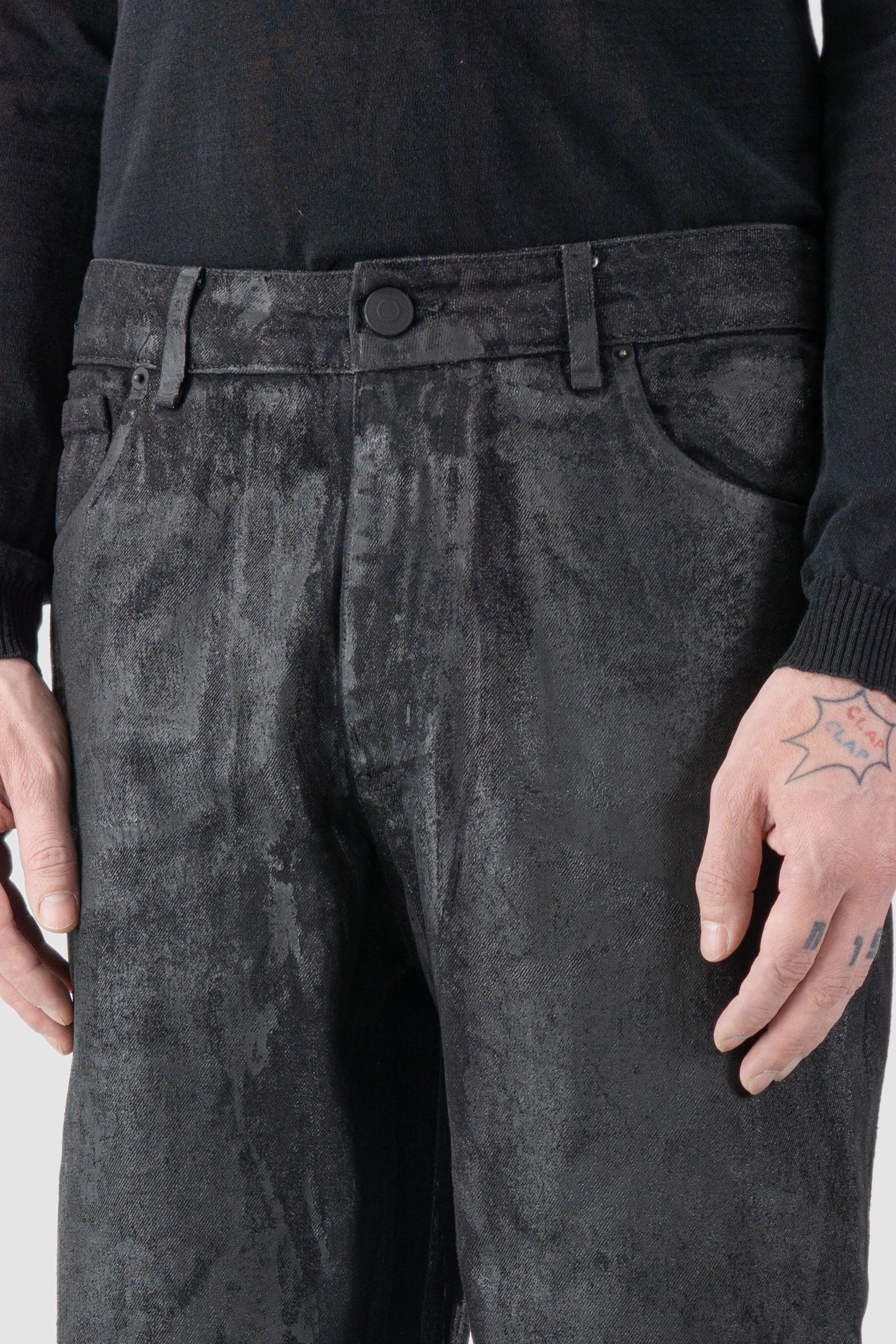 La Haine Inside Us - front detail view of men’s Black Hand-Painted Rubberized Coated Denim Jeans