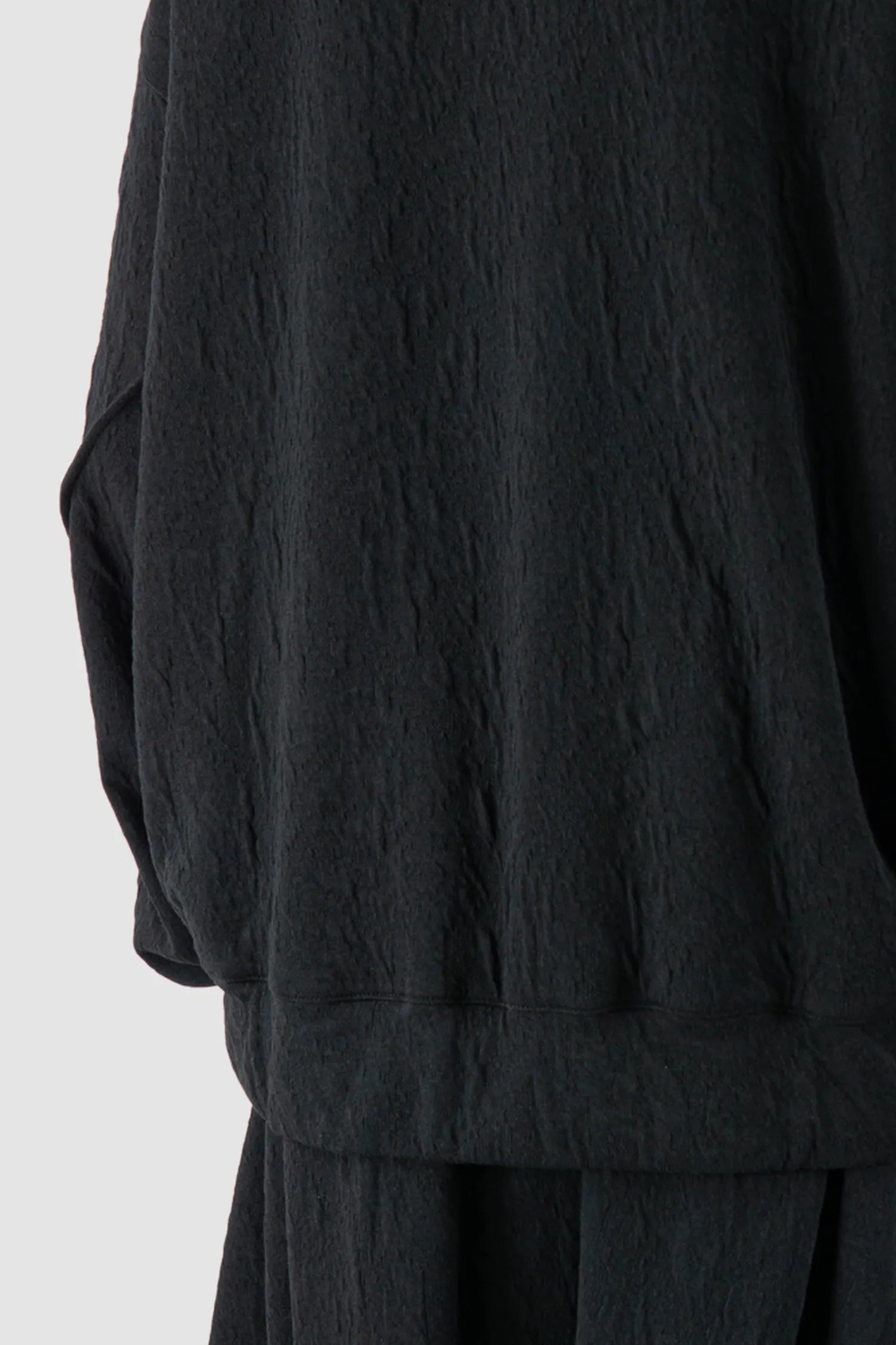 La Haine Inside Us - Men's Black High Neck Embossed Sweater - hem detail view