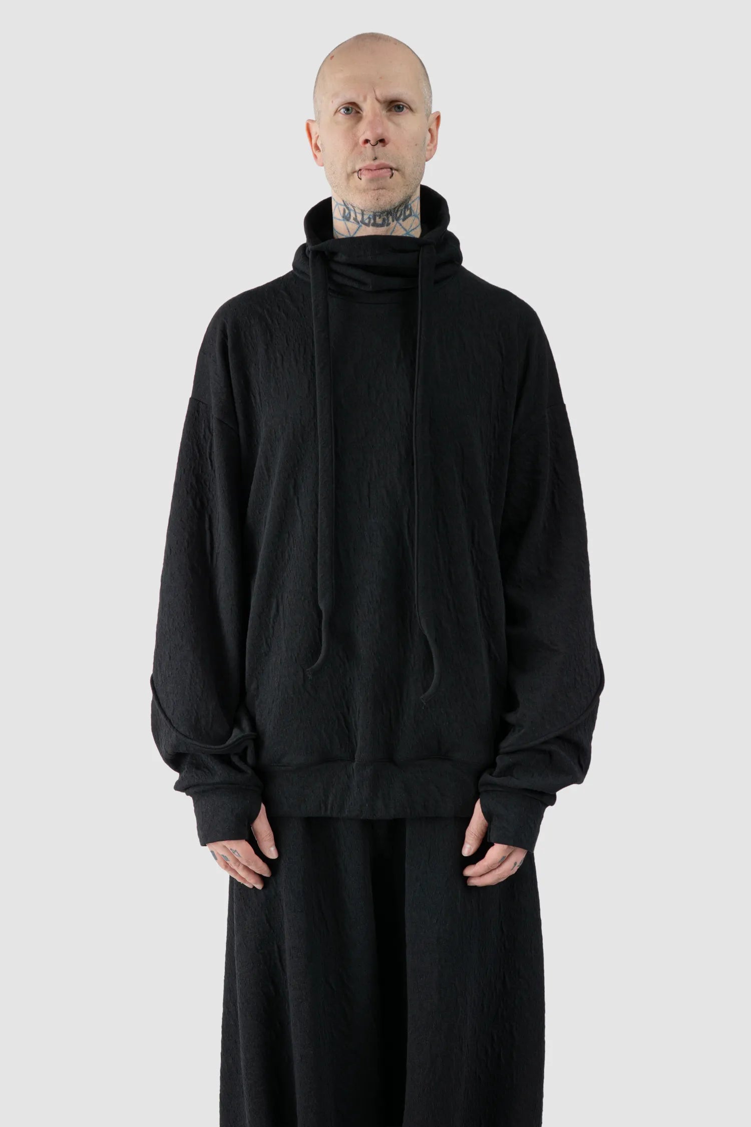 La Haine Inside Us - Men's Black High Neck Embossed Sweater - model front view - MONO-KROM | Gallery